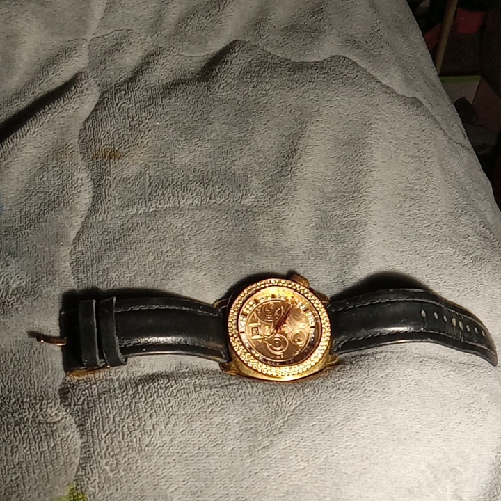 Marc Ecko Gold And Black Womens Watch 70$